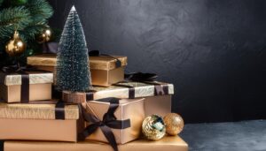 黒背景とゴールド装飾のクリスマスプレゼント