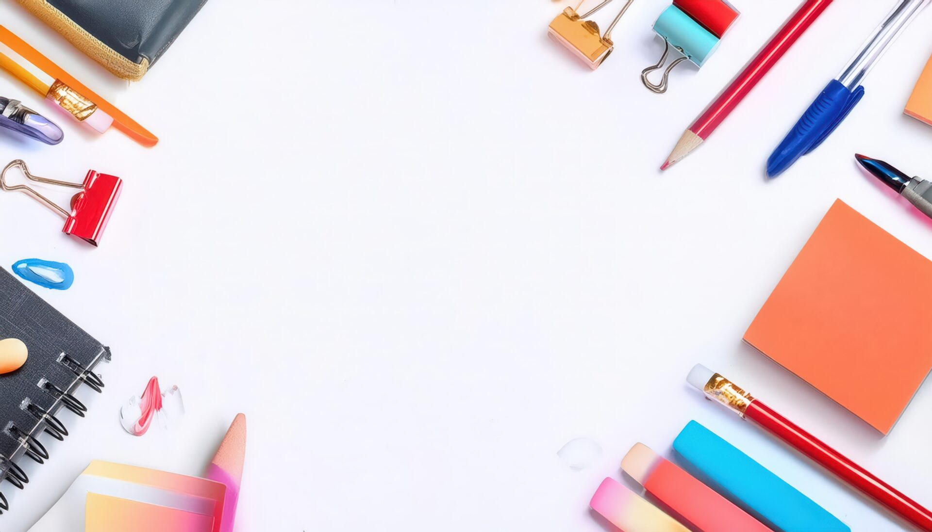 カラフルな文房具が並ぶ白い背景のフラットレイ