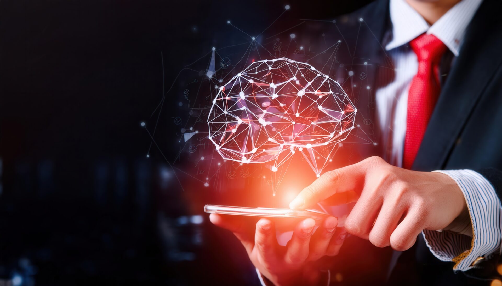 スマートフォンで操作する赤い脳のホログラム