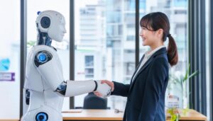 ビジネス女性とロボットが握手する場面