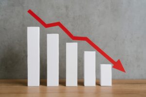 白い棒グラフと赤い下落矢印