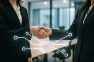 デジタルシンボルと握手するビジネスウーマン