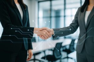 デジタル回路エフェクトと握手するビジネスウーマン