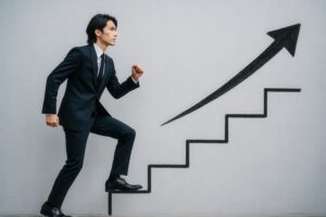 真剣な表情でキャリアアップを目指して階段を上るビジネスマン