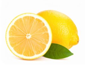 白背景に置かれたカットレモンと葉付きレモン