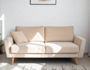 クッション付きのベージュ2人掛けソファ