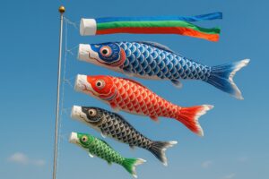 青空に泳ぐ色とりどりのこいのぼり