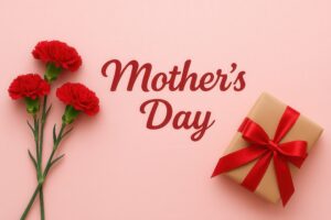 赤いカーネーションとクラフト包装のギフトと母の日文字