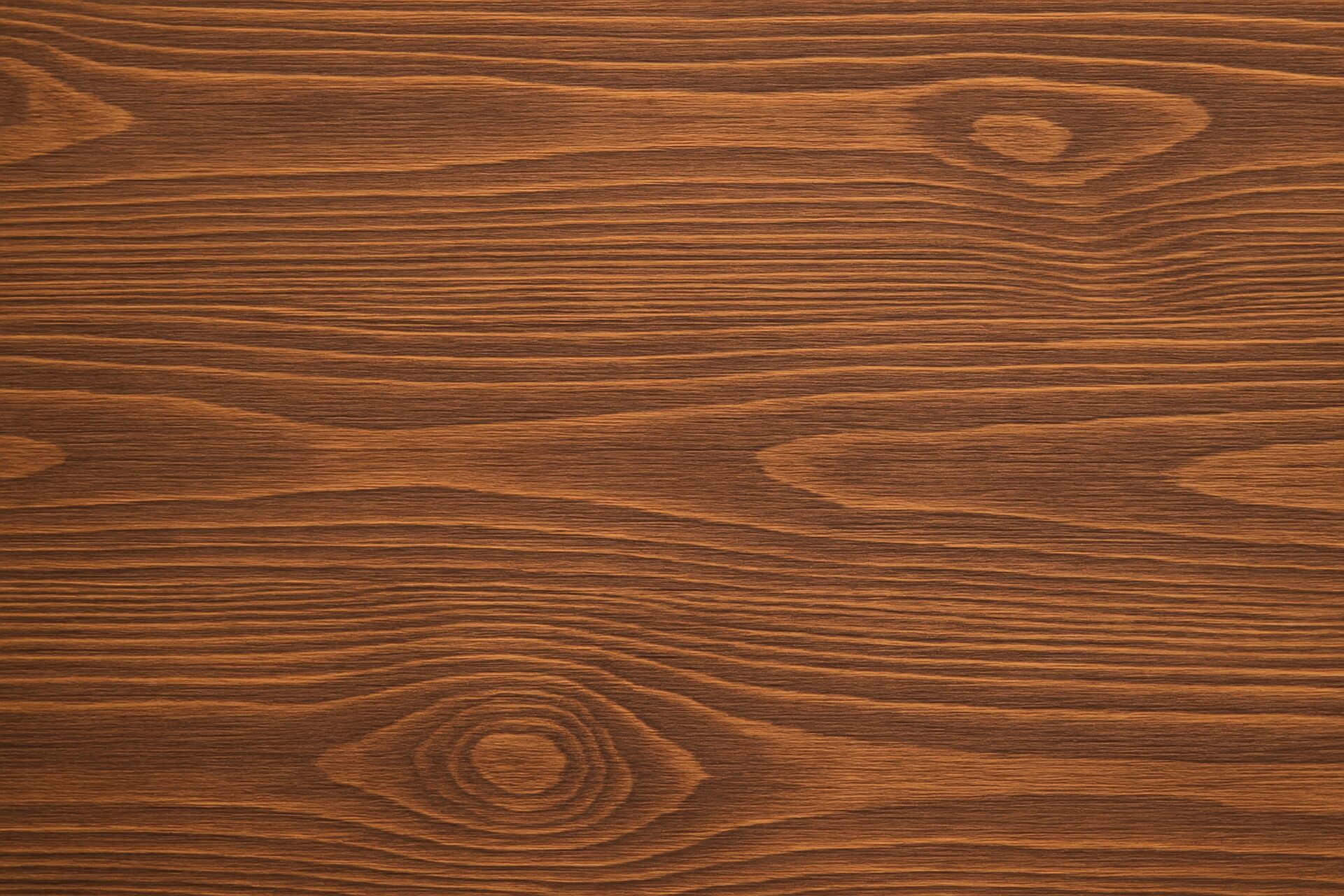 木目が際立つ濃い色の板の背景素材