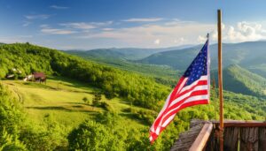 緑豊かな風景の中に掲げられた星条旗