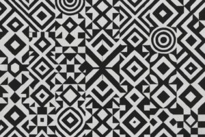 重なり合う白黒の菱形と円が特徴的な幾何学背景