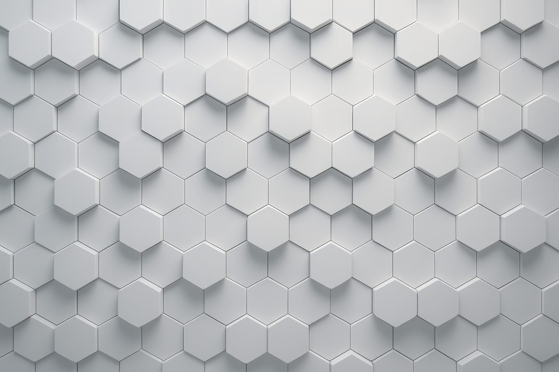白の立体的な六角形が並ぶ幾何学的テクスチャ背景