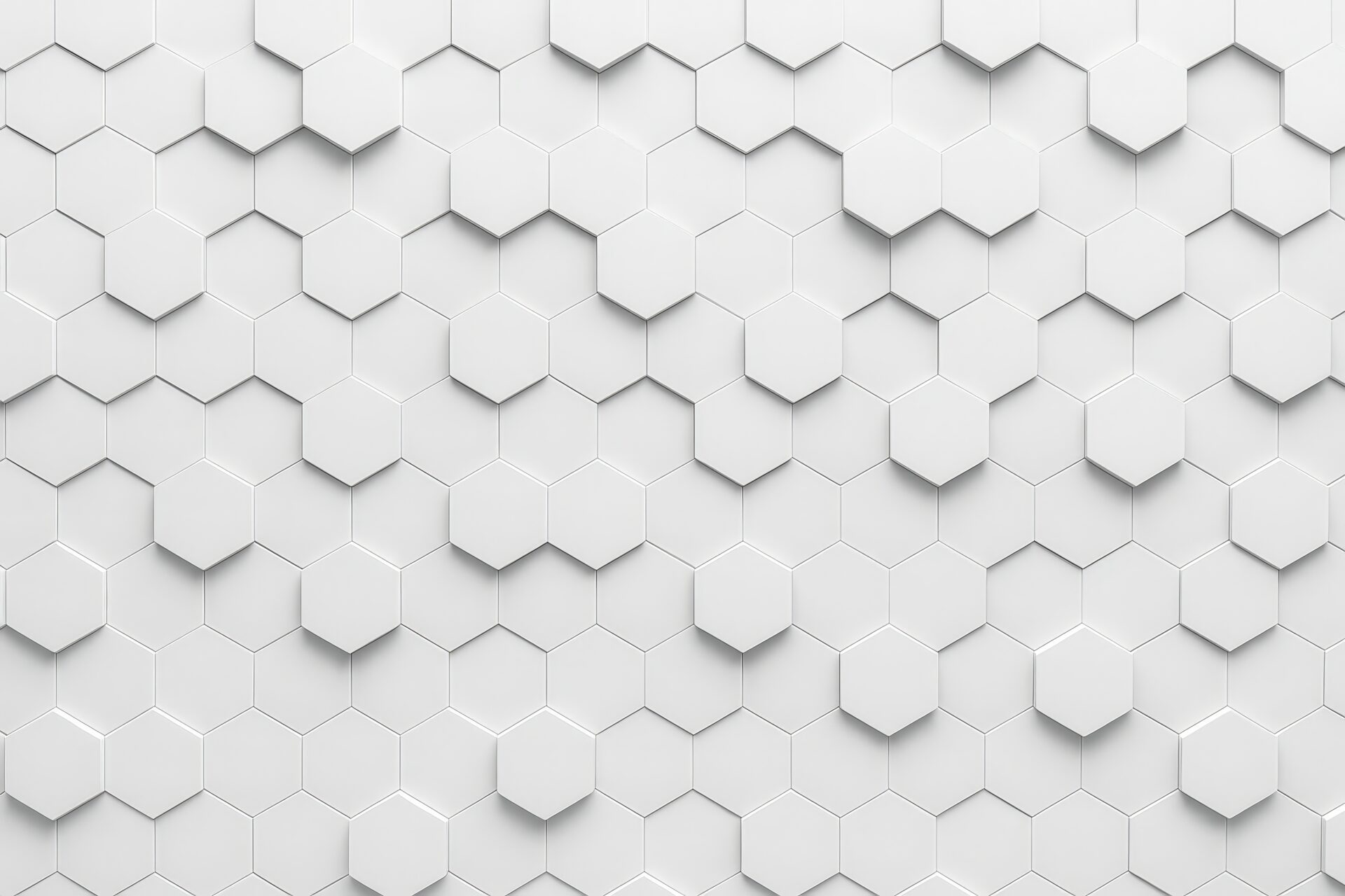 白い六角形が整然と並ぶ立体的なモノクロ背景