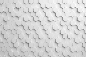 光と影が際立つ白の立体ハニカム構造背景