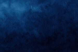 濃紺グラデーションと斑点のある背景