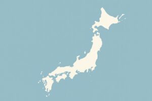 青背景に浮かぶ白地図の日本