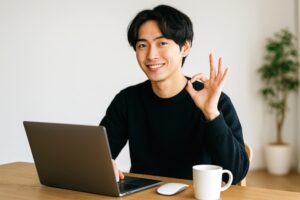 OKジェスチャーをする黒い服の若い男性