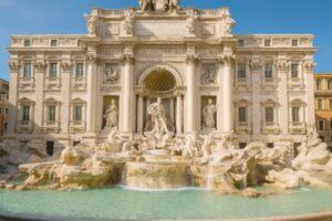 朝の光が差し込むローマのトレヴィの泉の広角構図