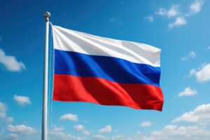 ポールに掲げられたロシア国旗と晴天の空