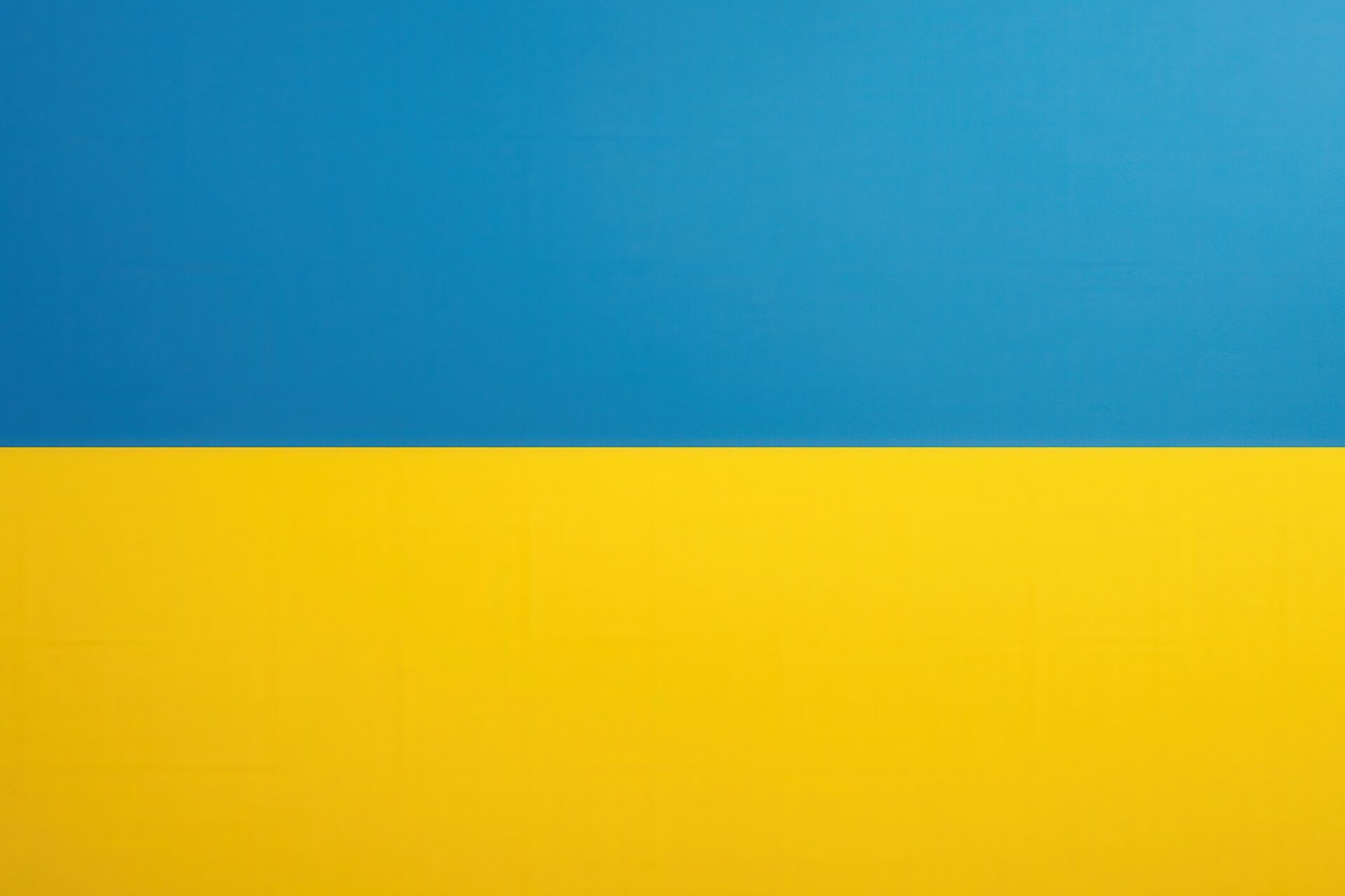 ウクライナ国旗のテクスチャ背景（上青・下黄）