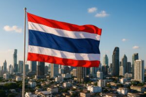 バンコクの高層ビル群とタイ国旗
