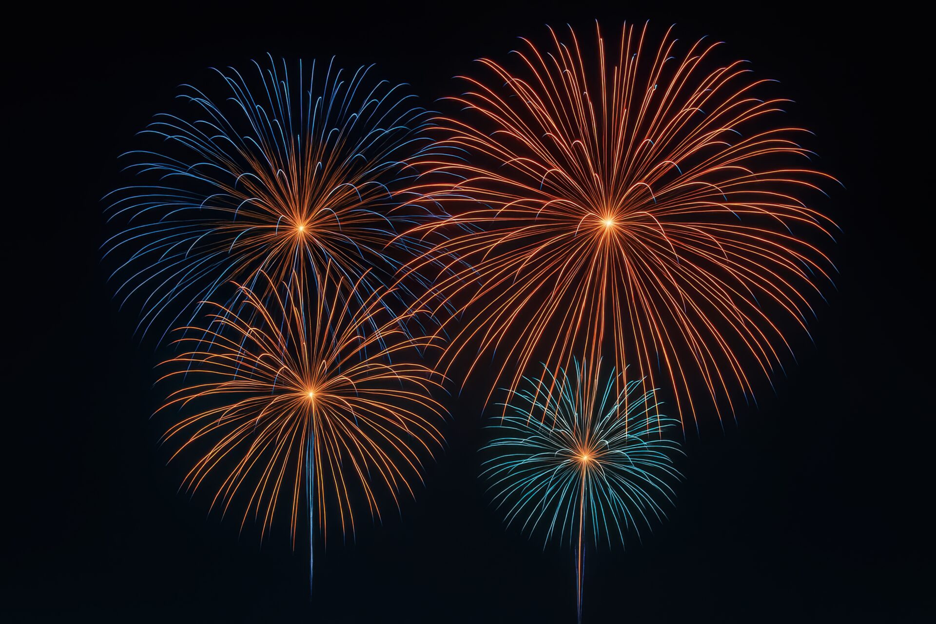 夜空に咲く色とりどりの花火4発