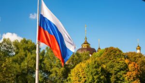 山の風景とロシア国旗