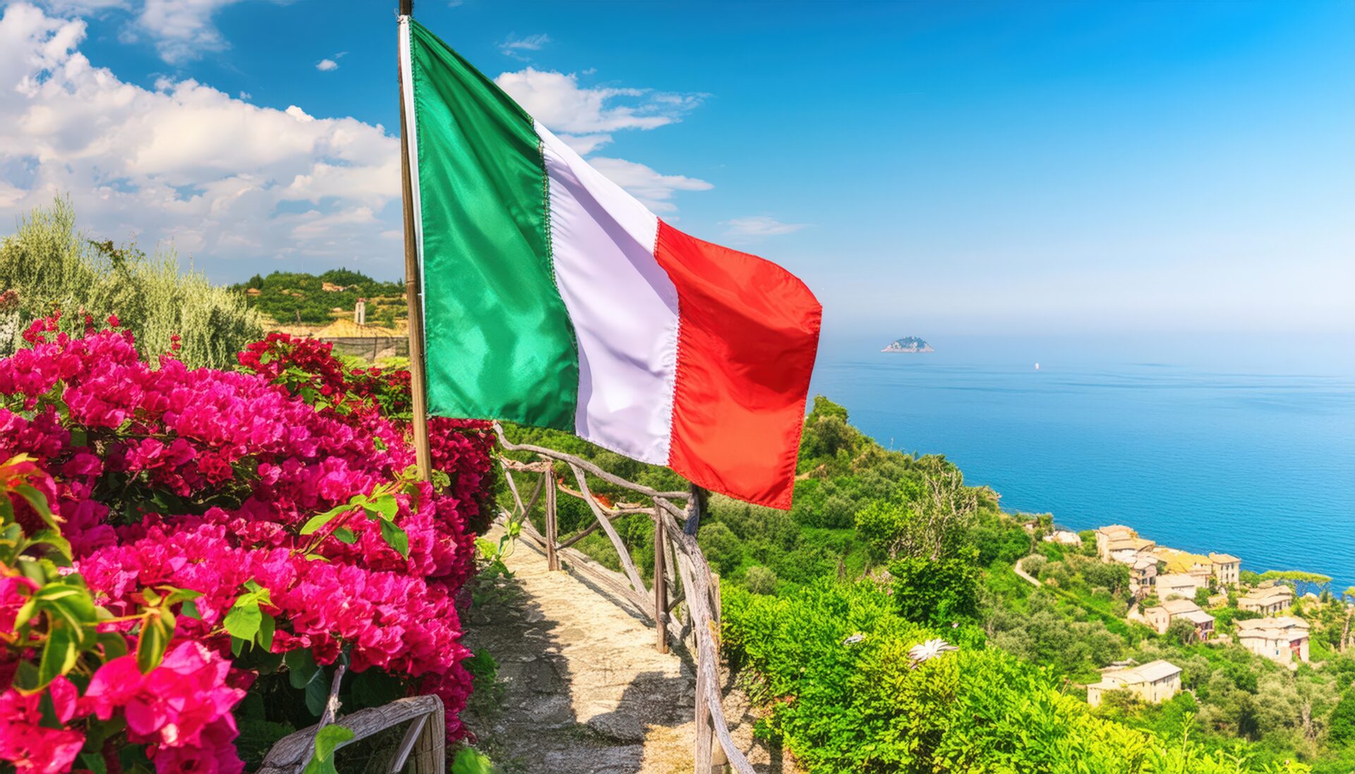 海と花々を背景に掲げられたイタリア国旗