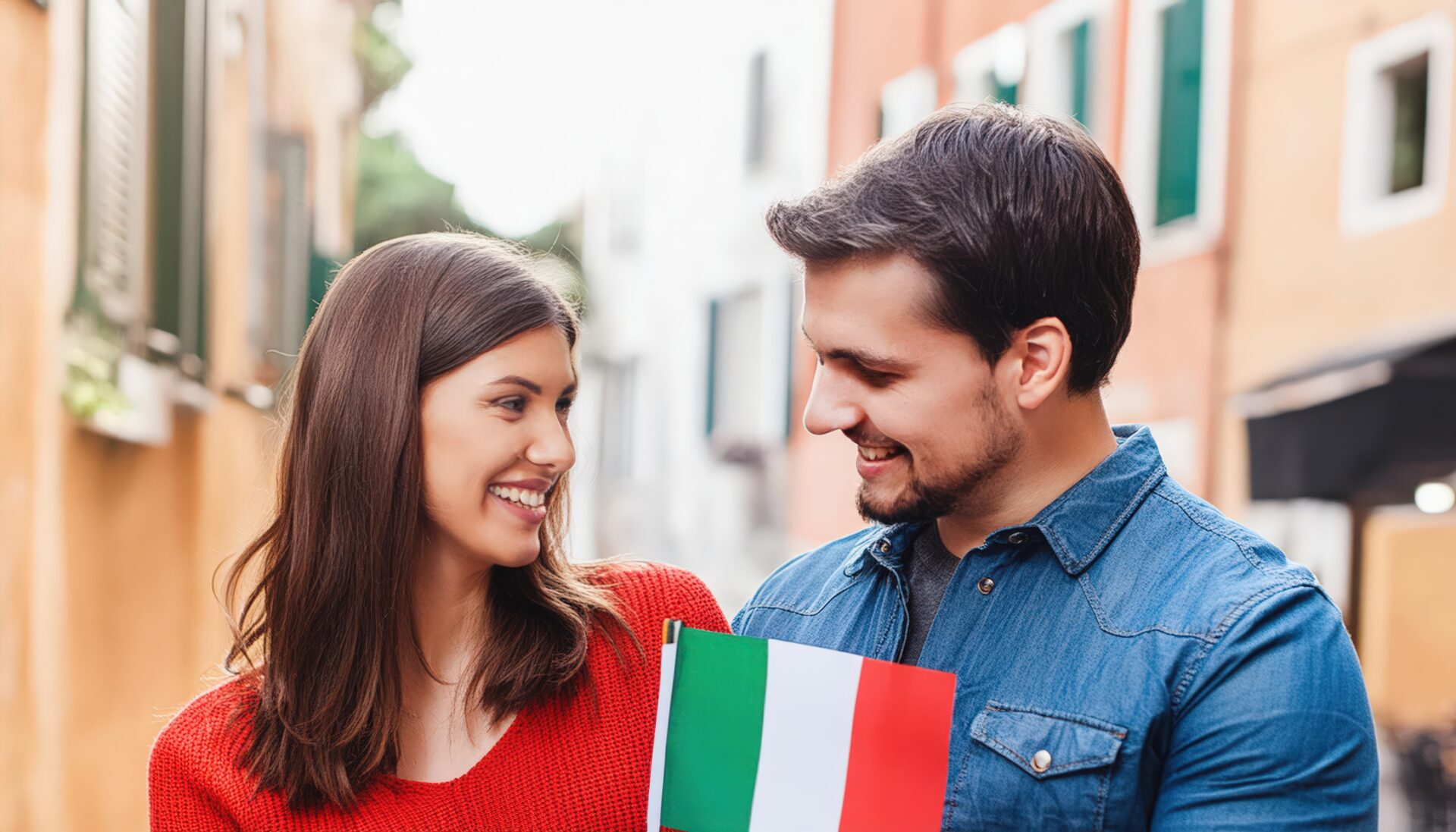 イタリア国旗を手に持つカップル