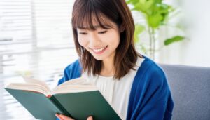 本を読む女性（ブルーカーディガン）