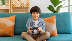 ゲームで遊ぶ少年 (5)