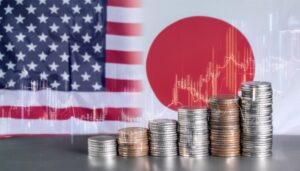 日米の国旗とコインで表現する金融市場