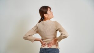 腰痛を訴える女性1