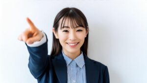 オフィスでスーツ姿の若い人が指をさす