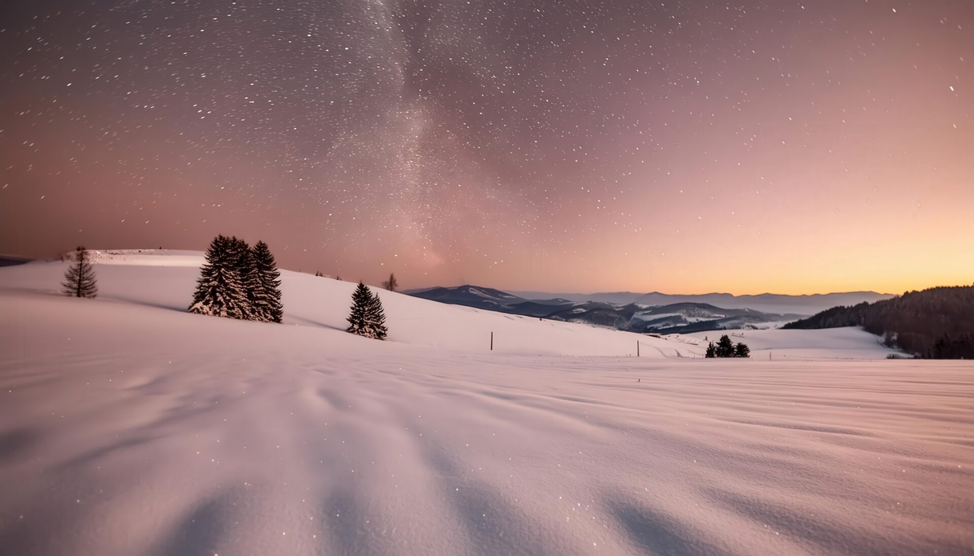 冬の星空と丘陵地帯