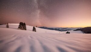 冬の星空と丘陵地帯