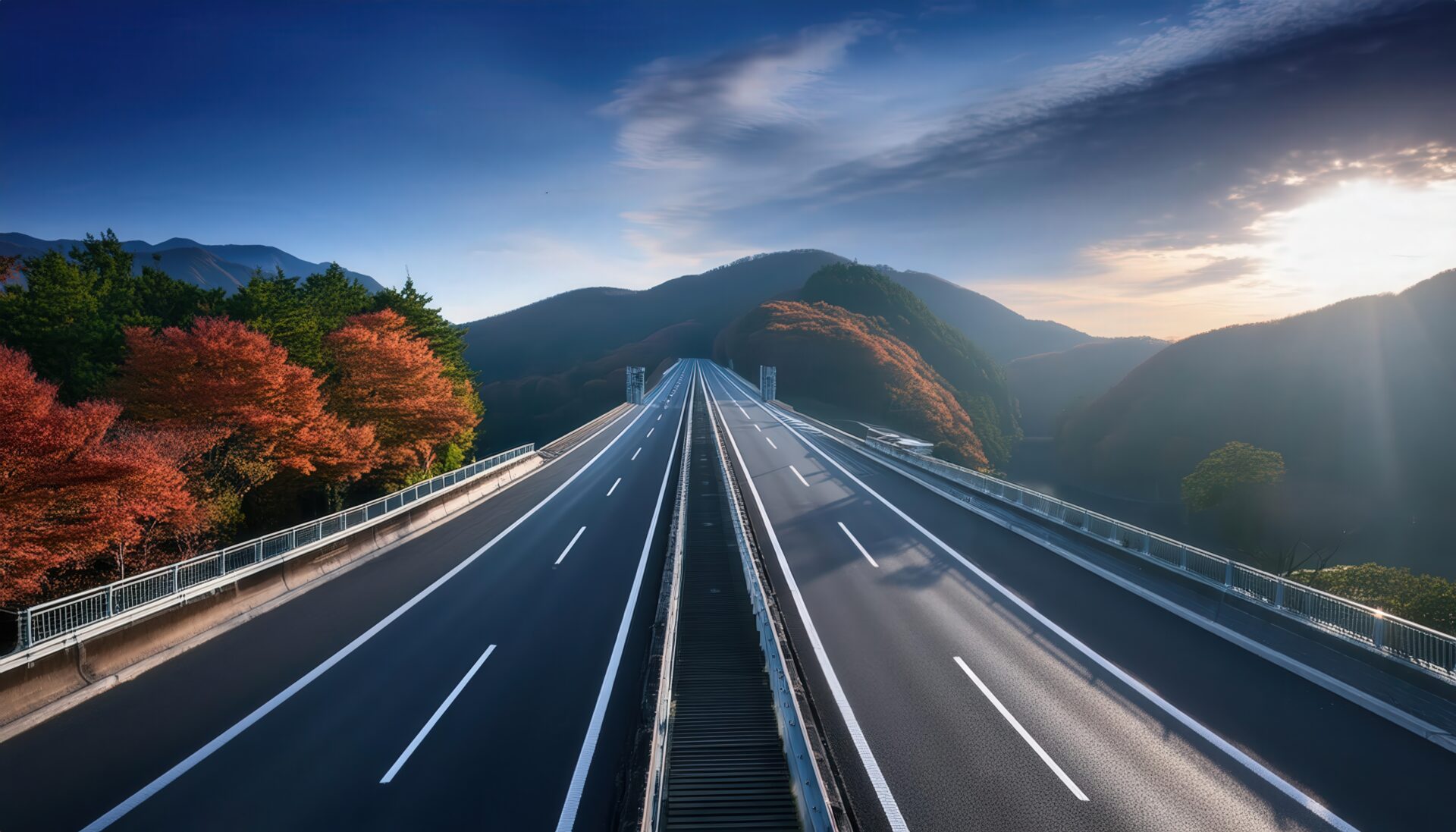 紅葉と山並みの高速道路