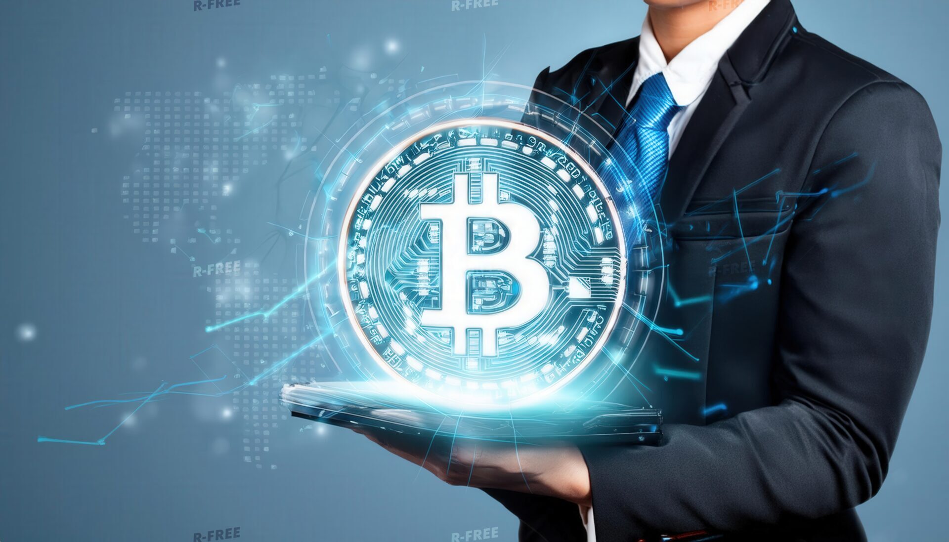 ビットコインとタブレットを持つスーツの男性