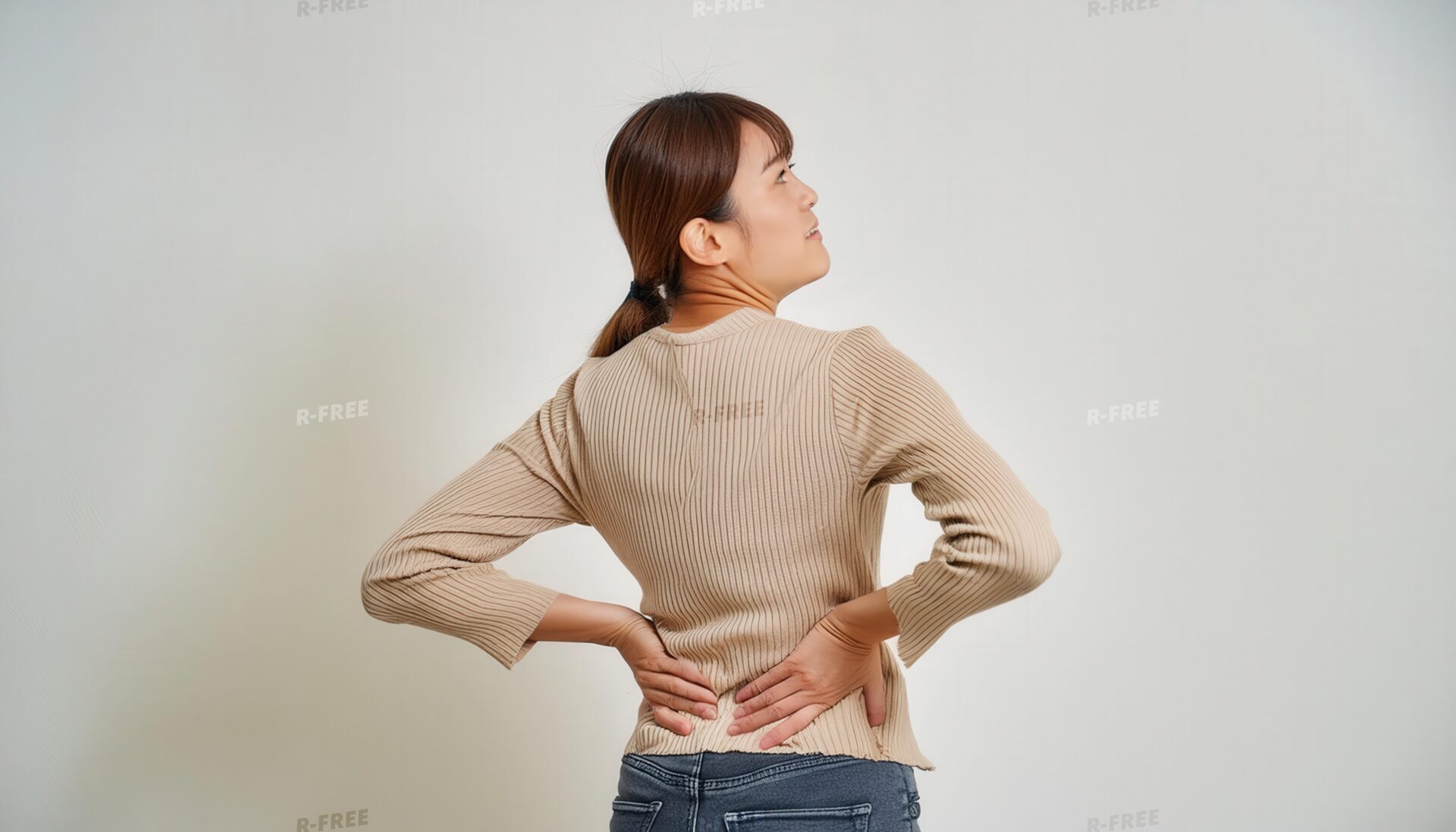 腰痛を訴える女性1