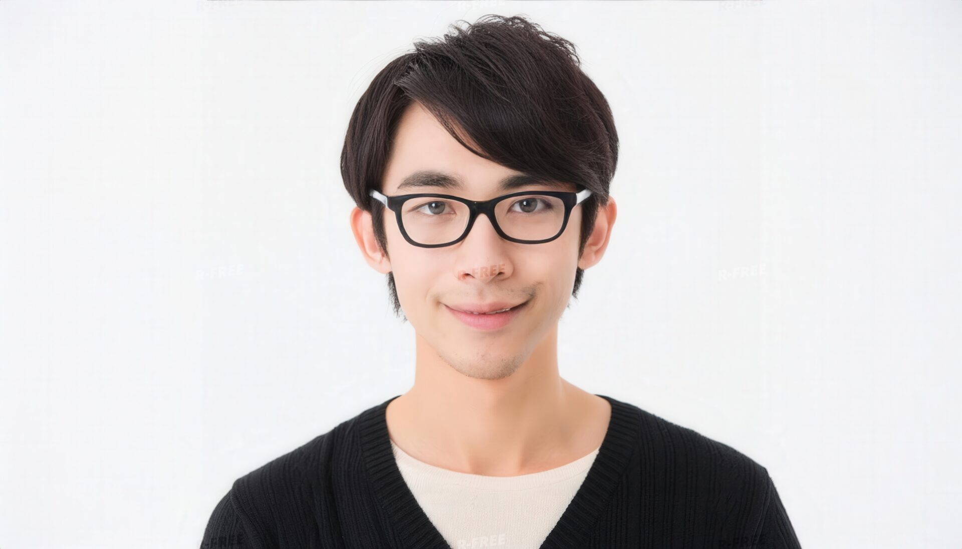 メガネをかけた男性の笑顔