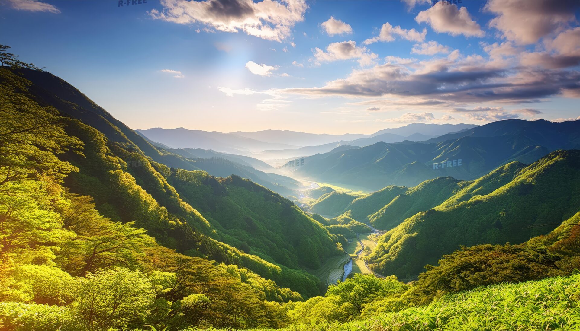 朝焼けの山々と渓谷