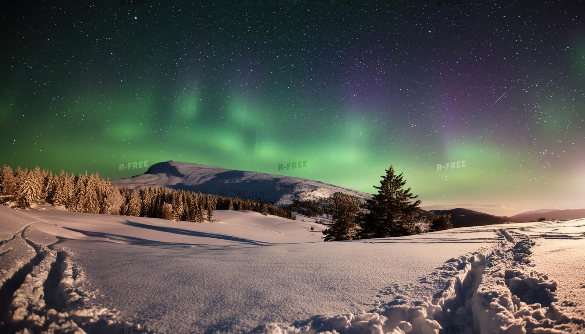 オーロラと雪山の夜空